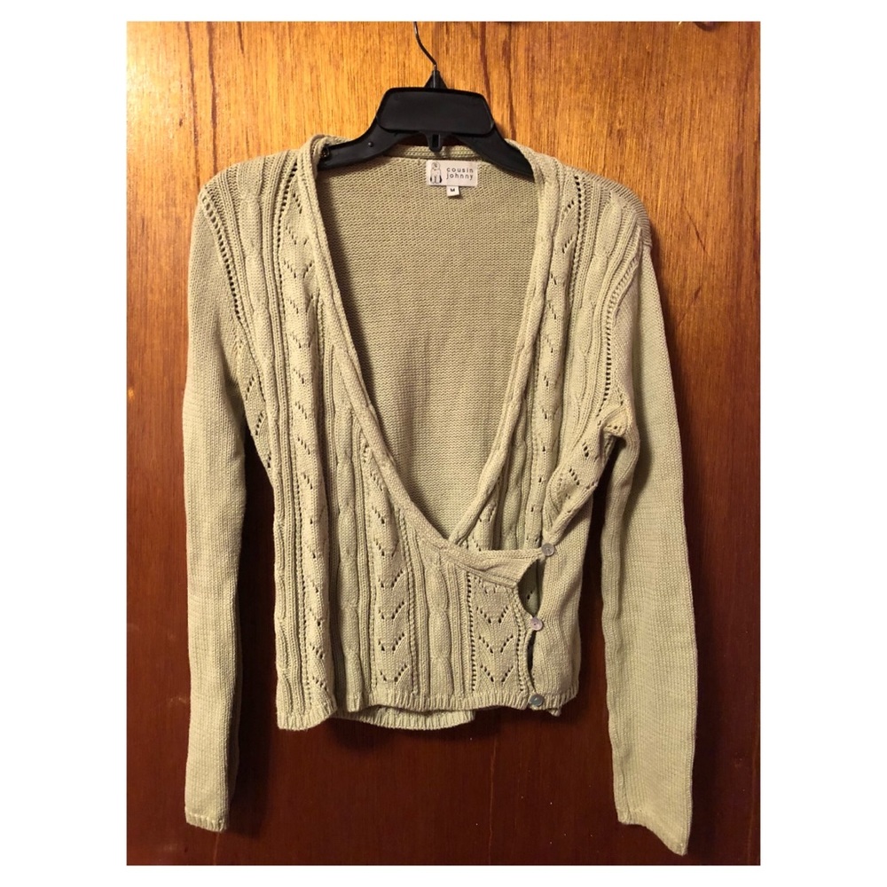 Light green sweater with side buttons